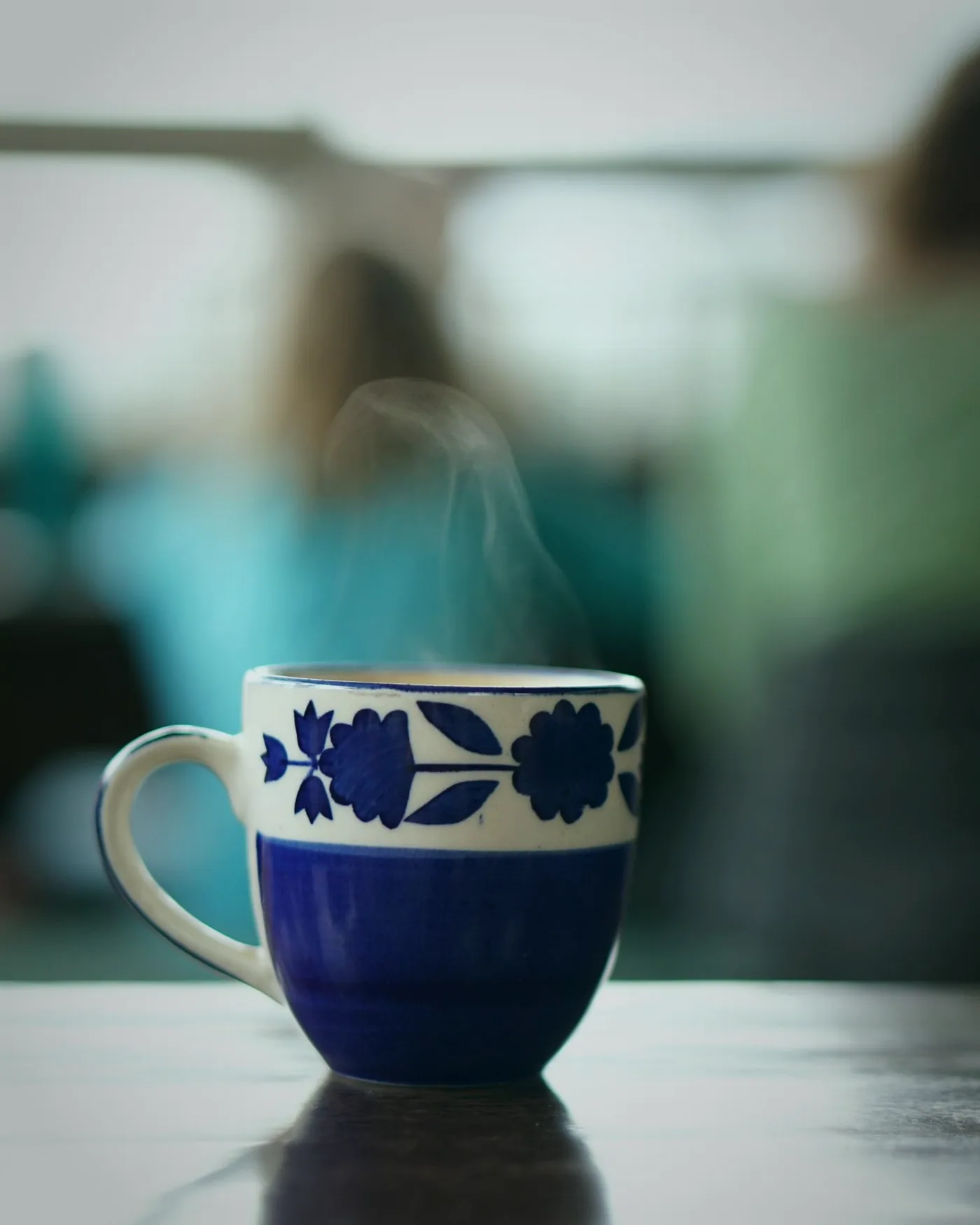A stoneware mug of tea steaming on the old scale-room counter at Silver Wattles